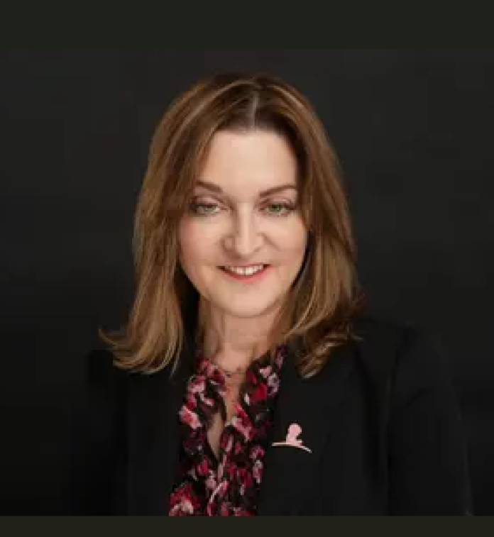 A photo of Andrea Gropman.